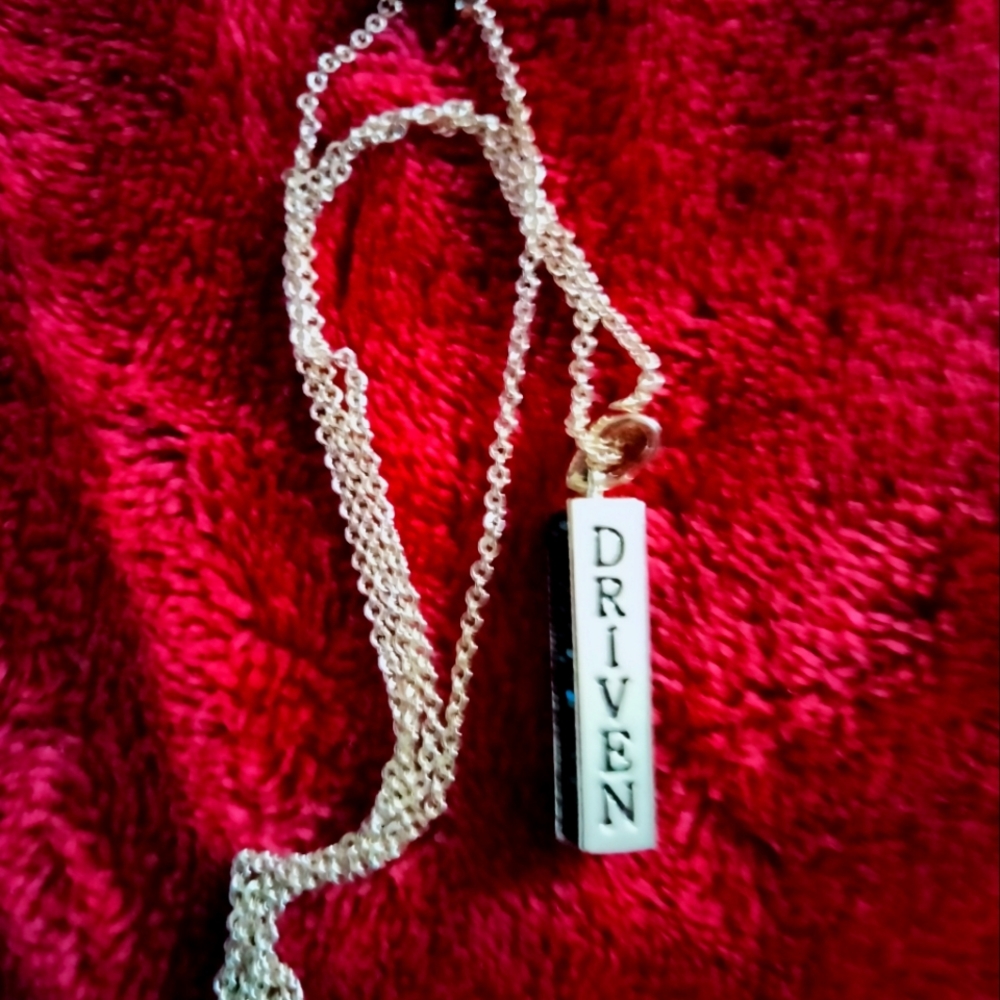 Purpose Driven pendant on an 8" chain. Like new condition